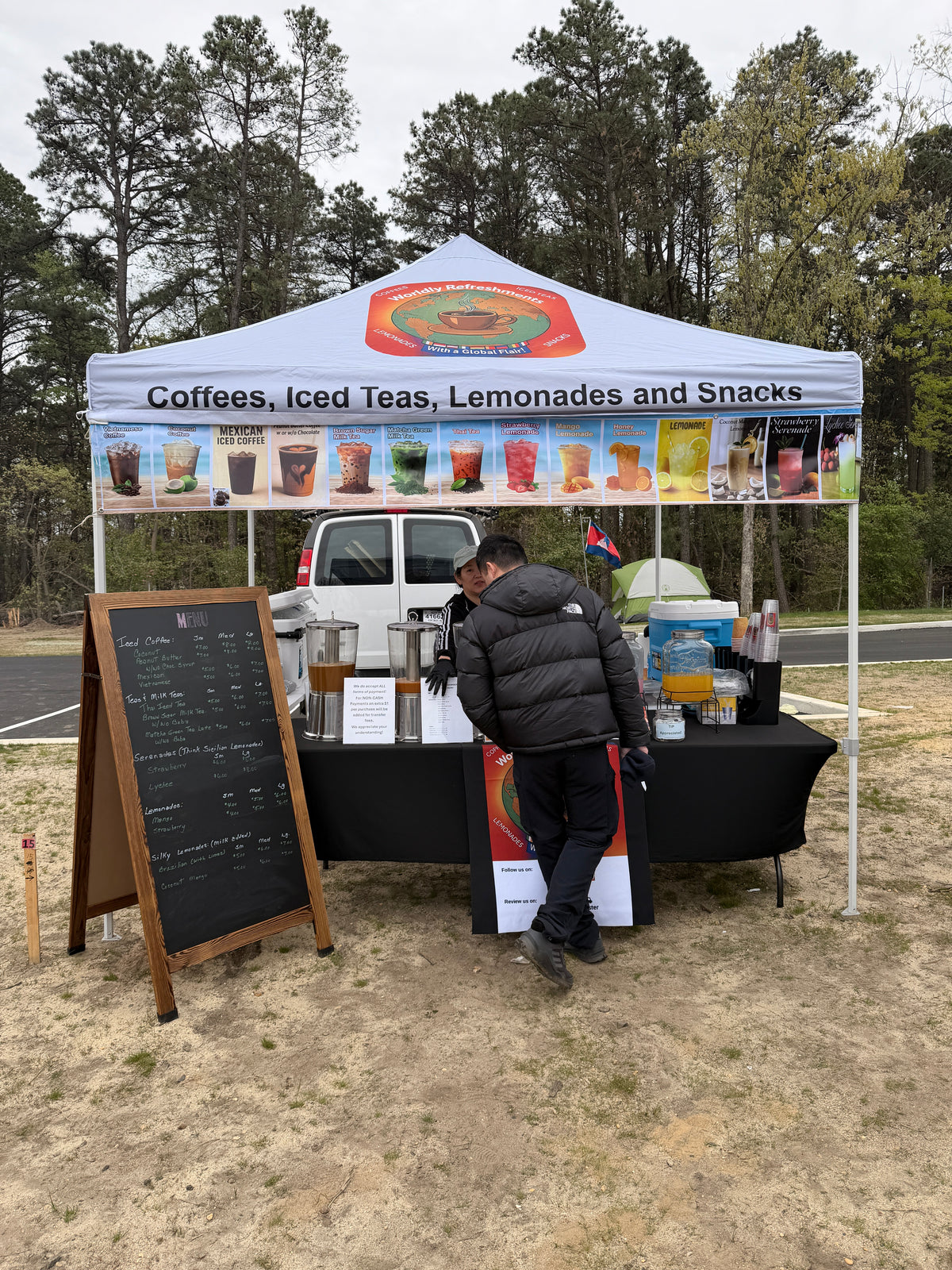 Worldly Refreshments coffee, iced tea, lemonade and snack booth at a Pennsylvania farmers market